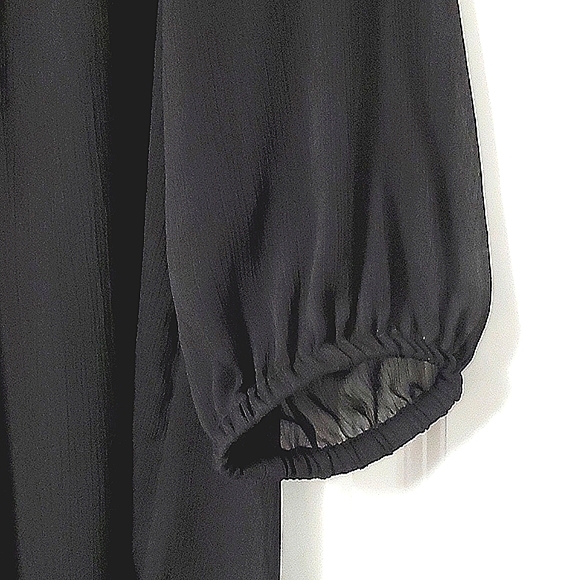 Black top with crochet lace in the front. - Picture 3 of 5